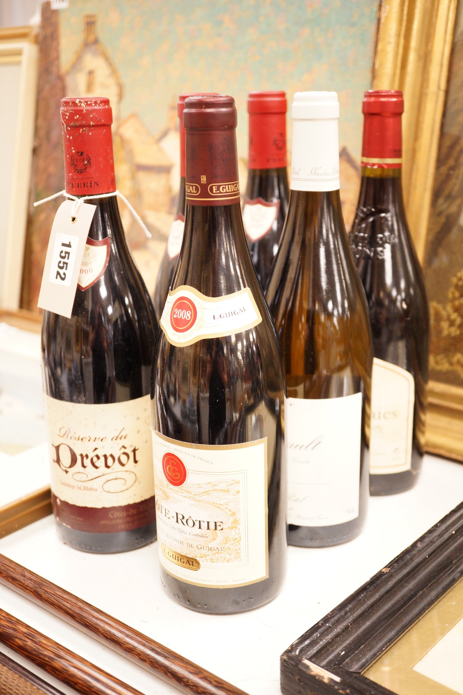 A group of 6 various bottles of wine